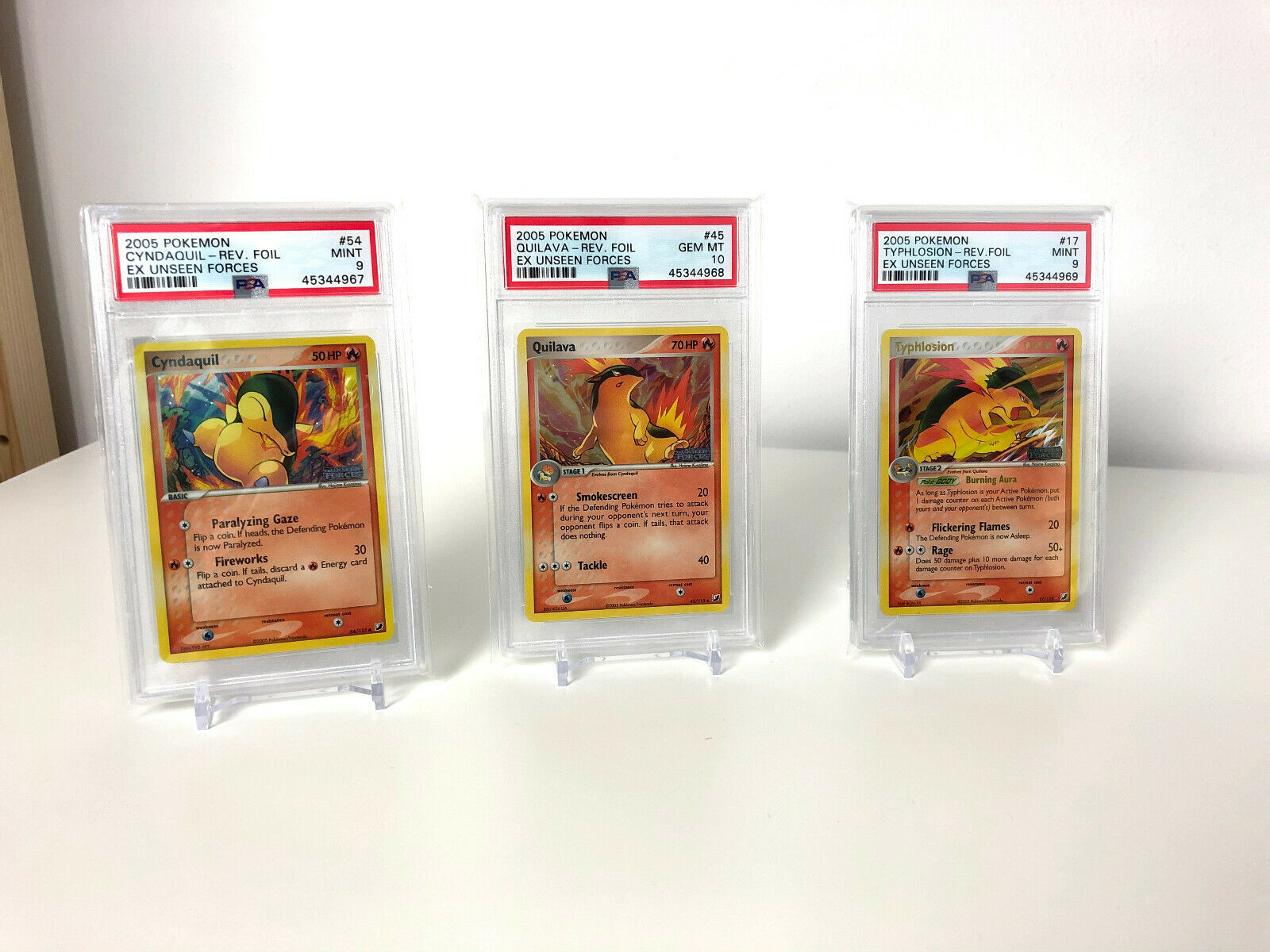 POKEMON EX UNSEEN FORCES REVERSE CyndaquilQuilavaTyphlosion PSA 910 