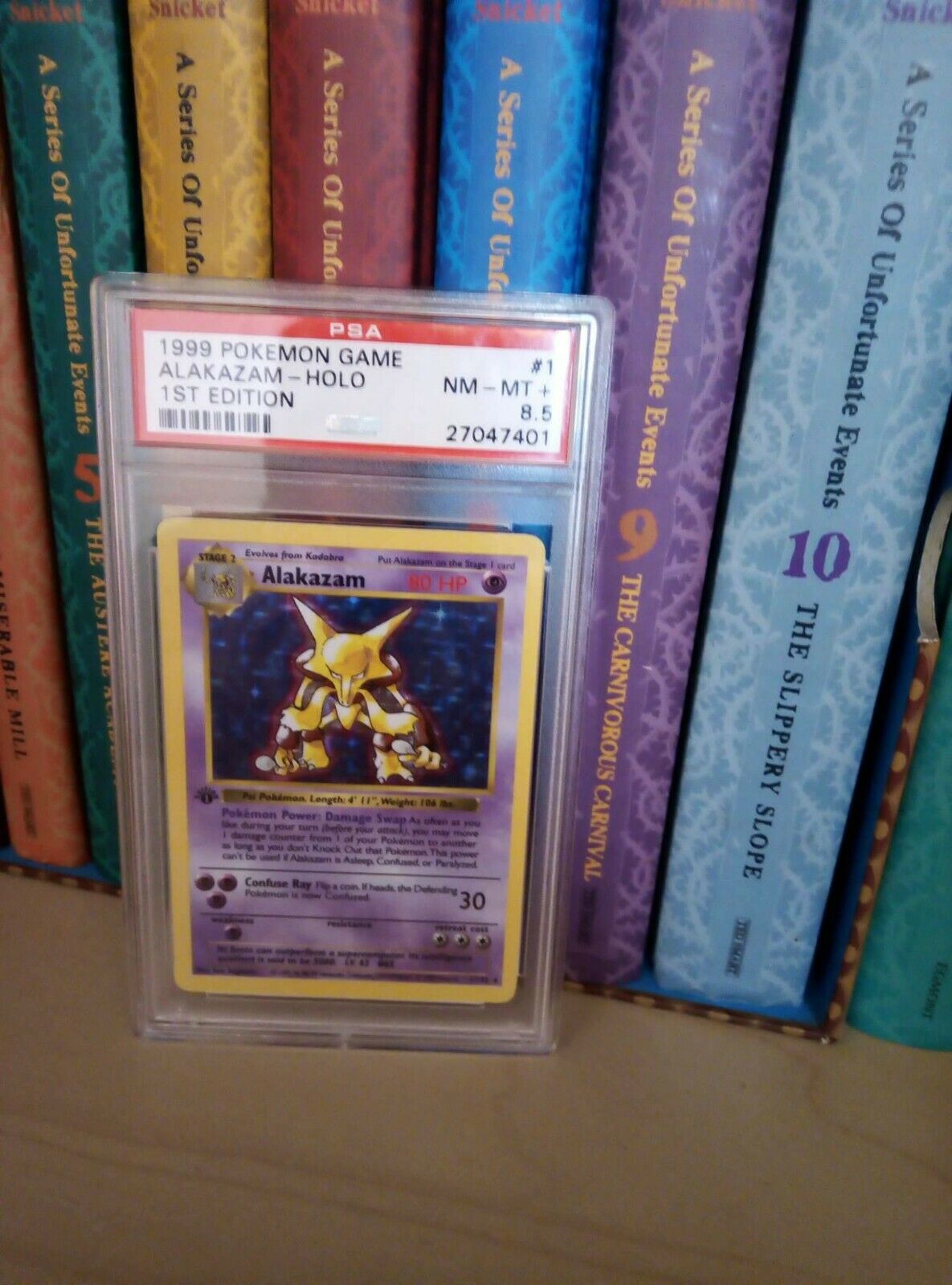 PSA 85 1ST EDITION BASE ALAKAZAM 1999 WOTC POKEMON