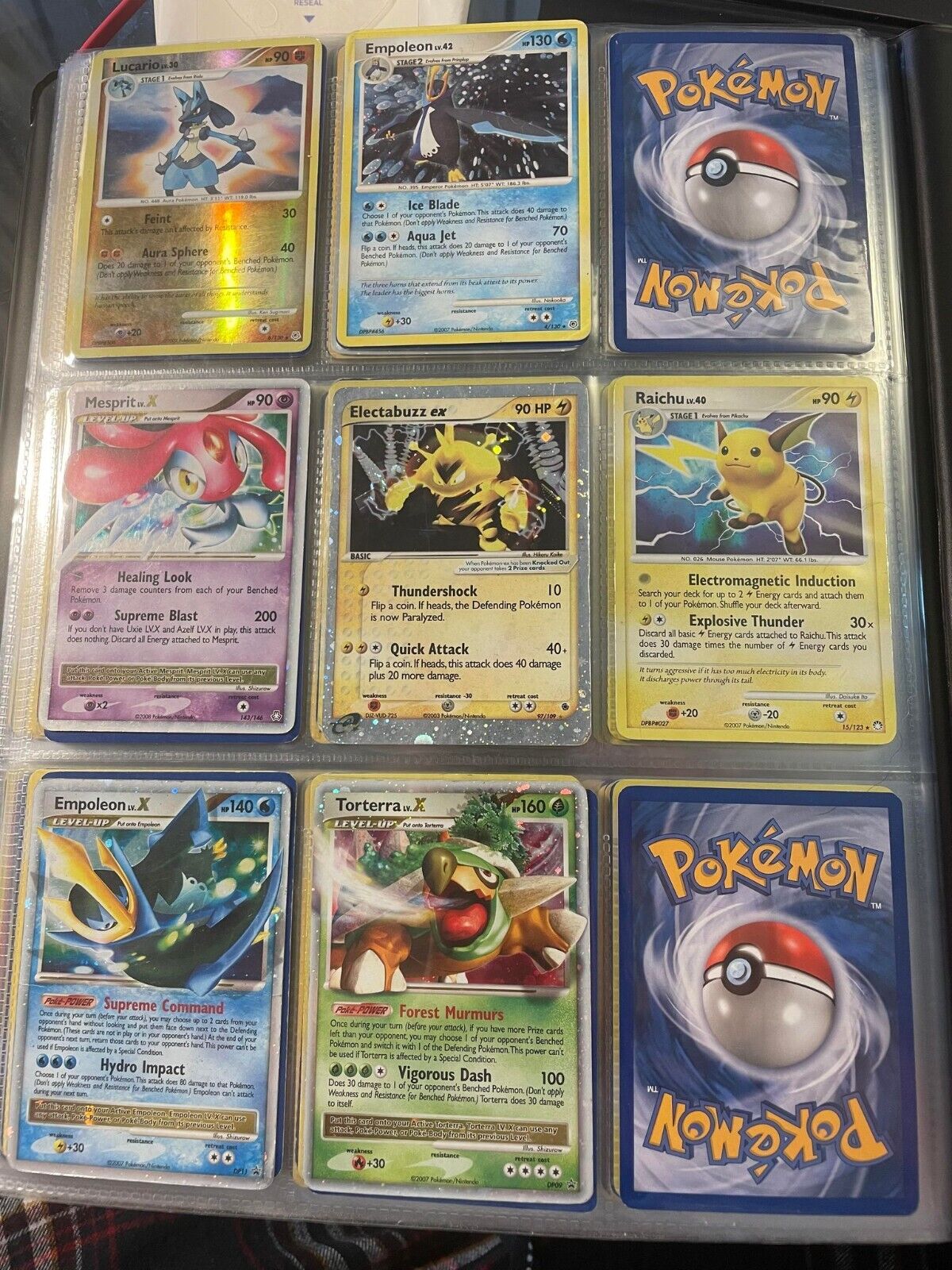 Pokemon 2007 card collection across 3 binders and 2 boxes around 700 cards
